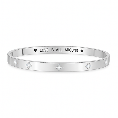 Silver Bangle with Clover Cubic Zirconia Details and “Love is All Around” Engraved Message