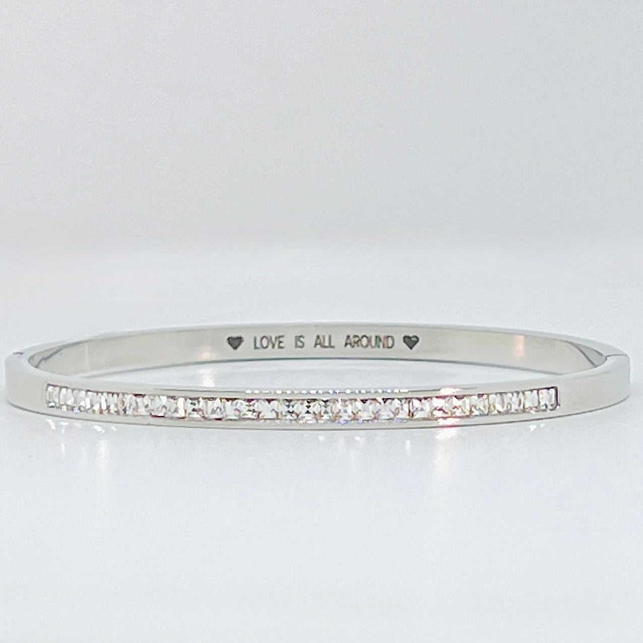 Silver Hinged Bangle with Sparkling Cubic Zirconia Band and "Love is All Around" Message