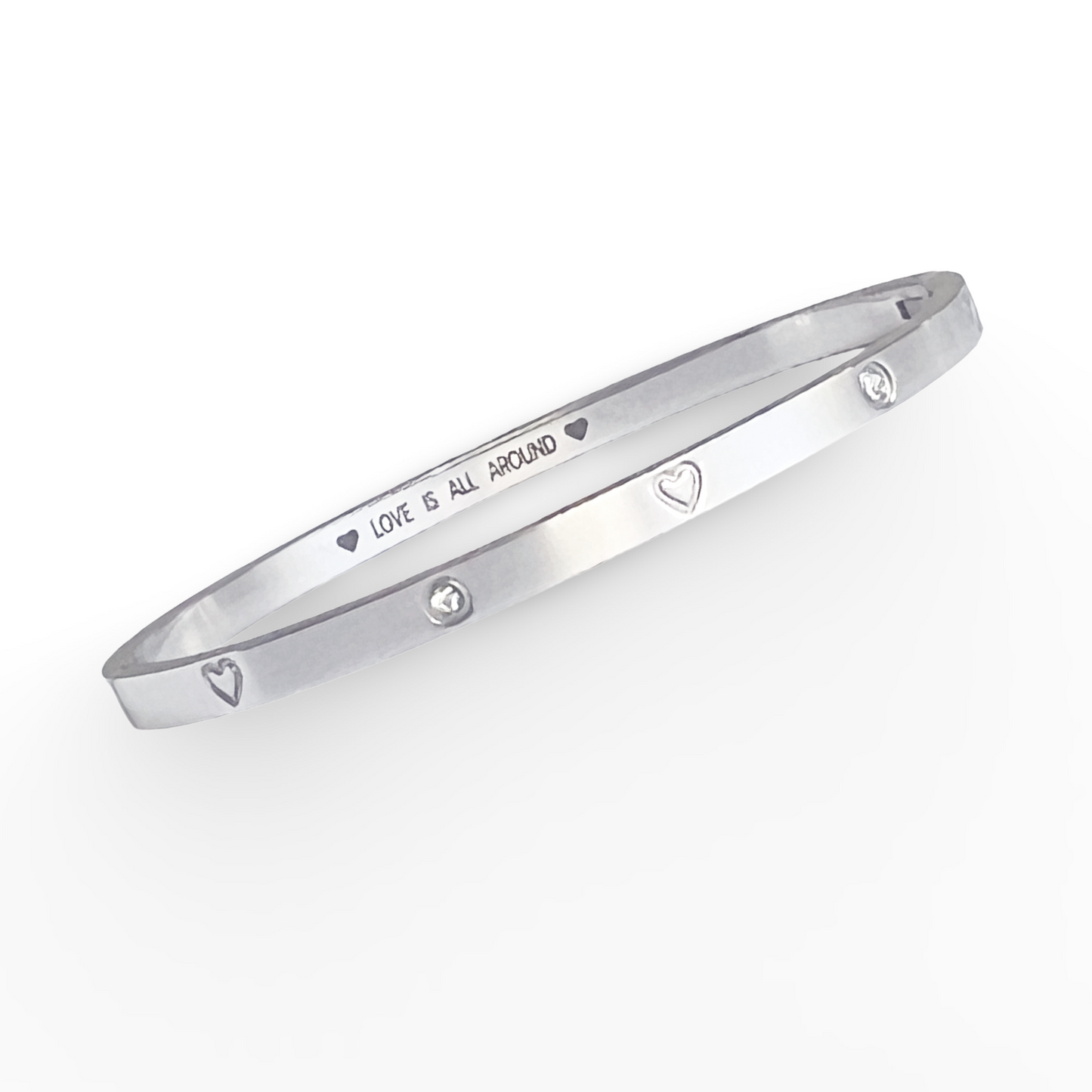 Silver bracelet with engraved text on a white background