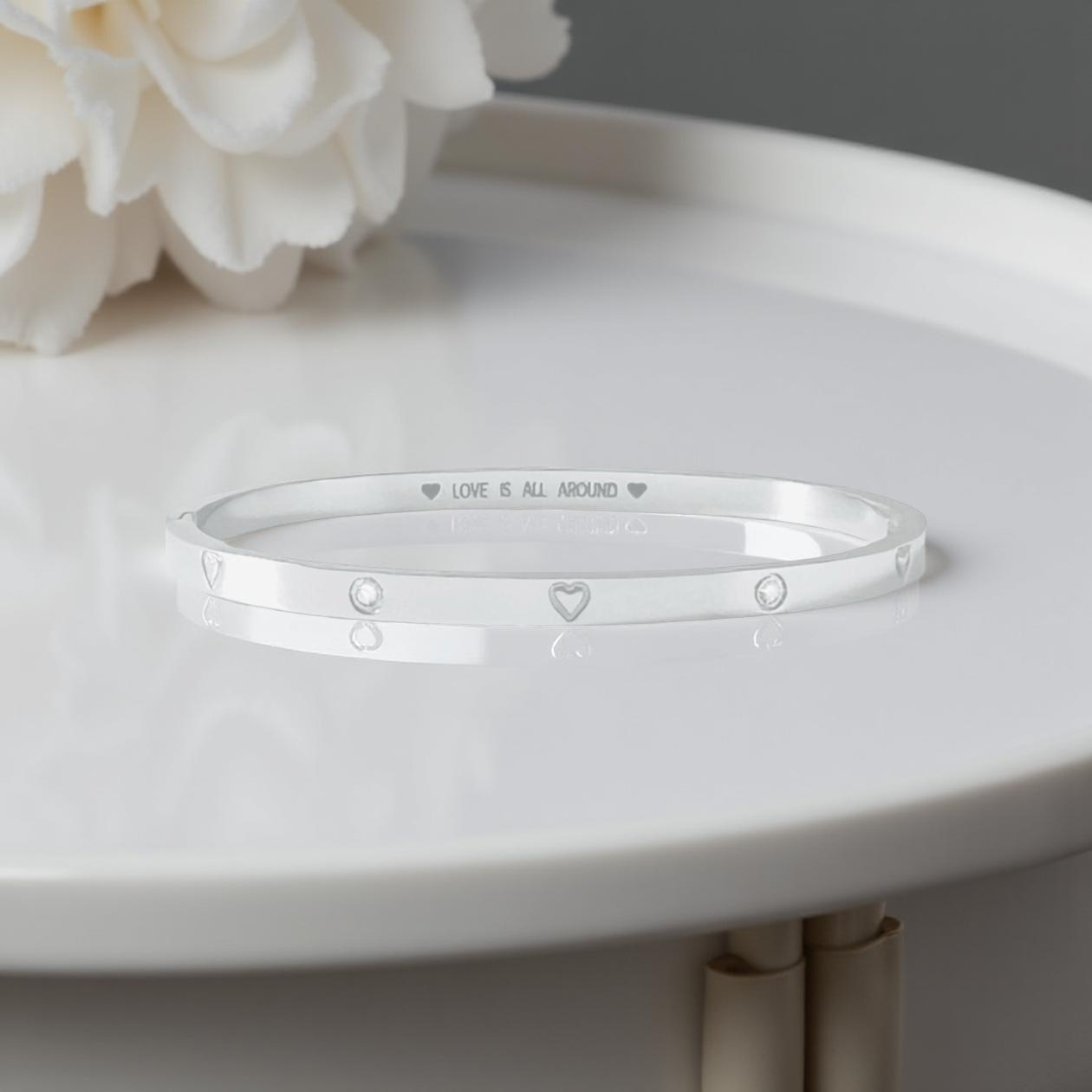 Silver Hinged Bangle with Hearts and Round Sparkling Gems with 'Love is All Around' message