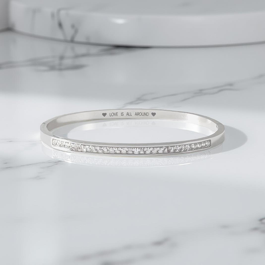 Silver Hinged Bangle with Sparkling Cubic Zirconia Band and "Love is All Around" Engraving