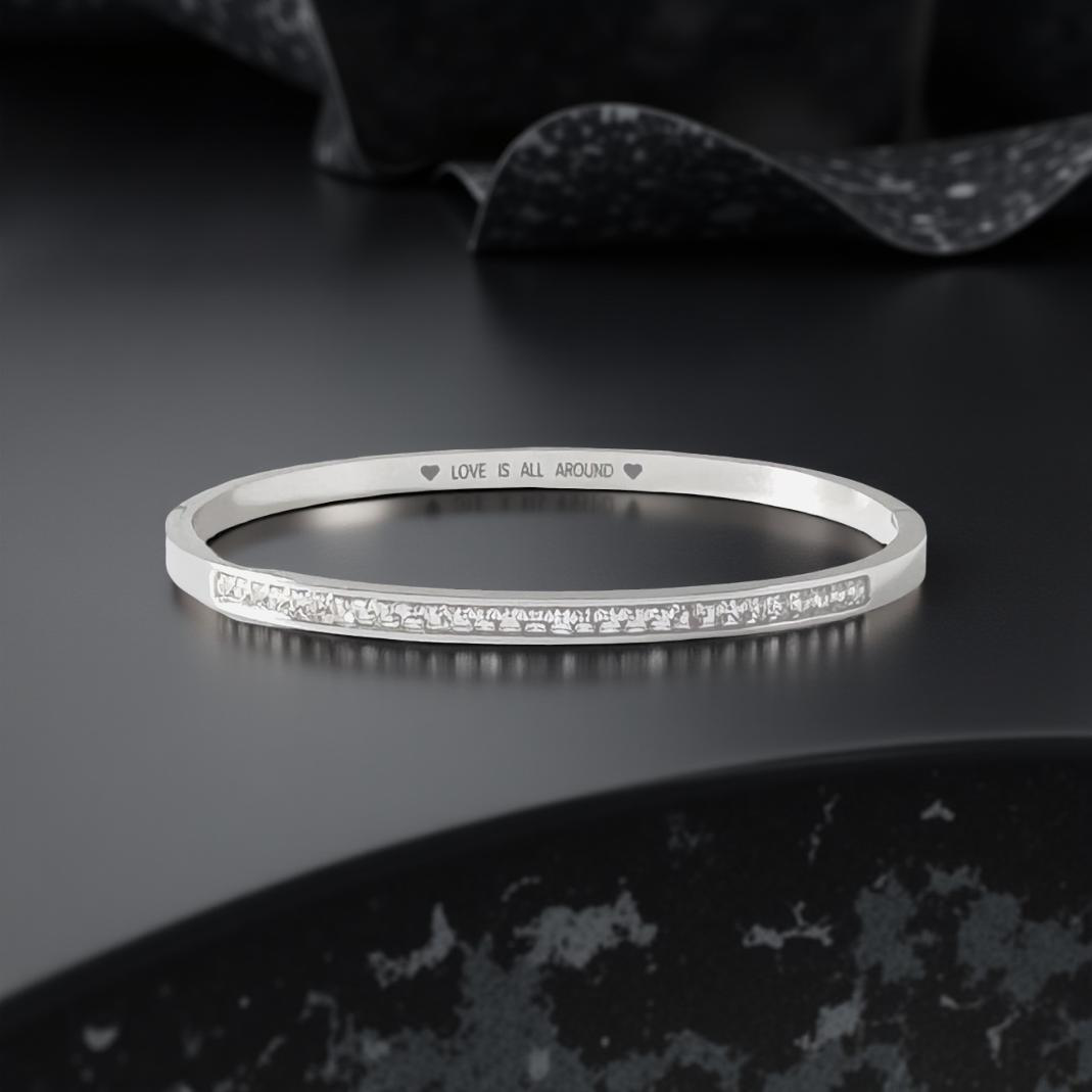 Silver Hinged Bangle with Sparkling Cubic Zirconia Band and "Love is All Around" Message