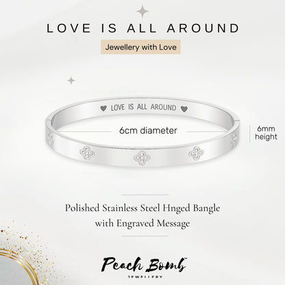 Silver Bangle with Clover Cubic Zirconia Details and 'Love is All Around' Engraved Message